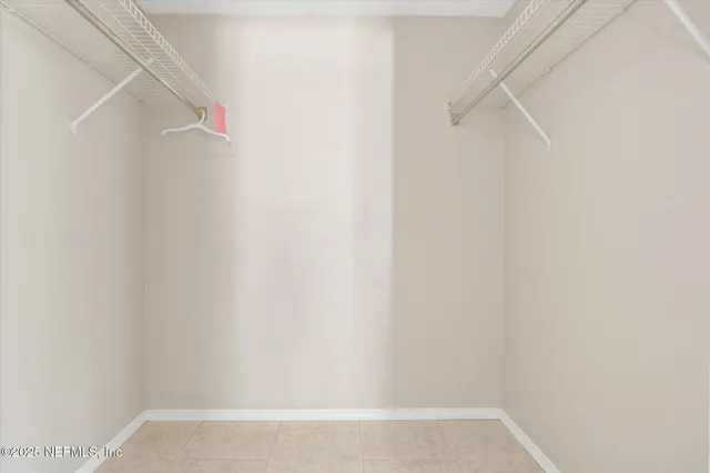 a view of small space with racks on the wall