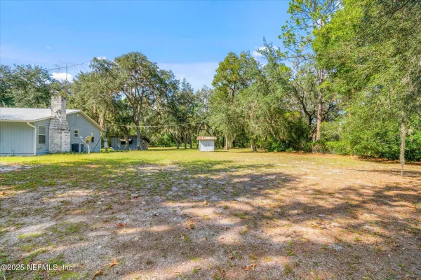 a view of a house with a swimming pool