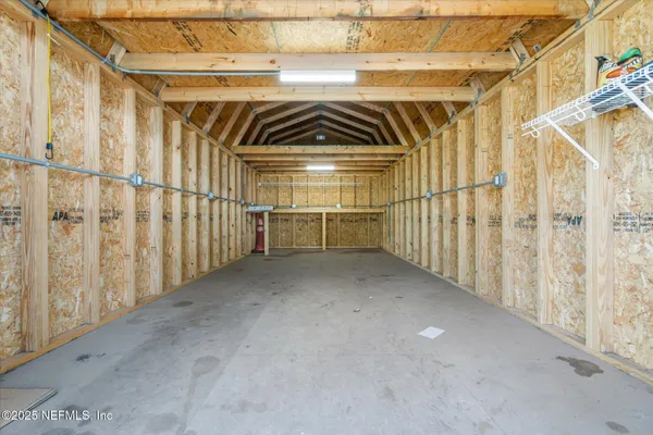 a view of a park with large trees