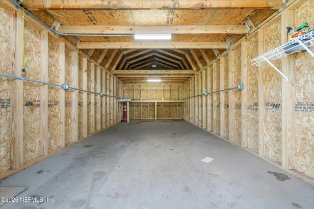 a view of a park with large trees