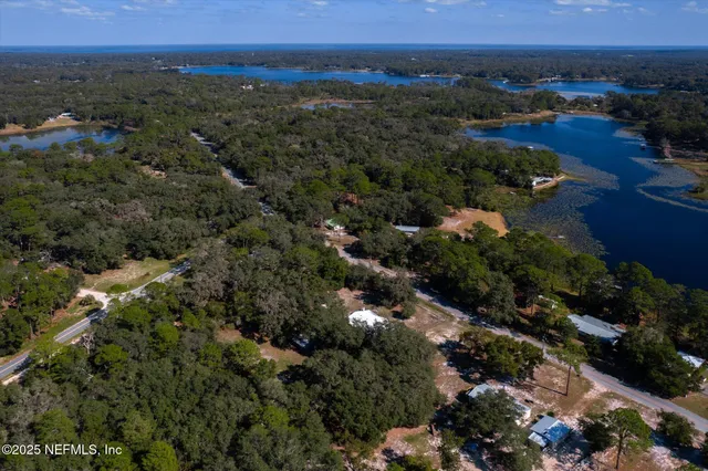 an aerial view of residential house and outdoor space