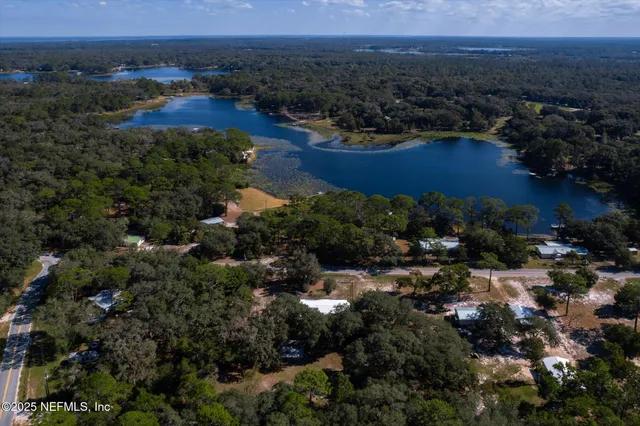 an aerial view of residential house and outdoor space