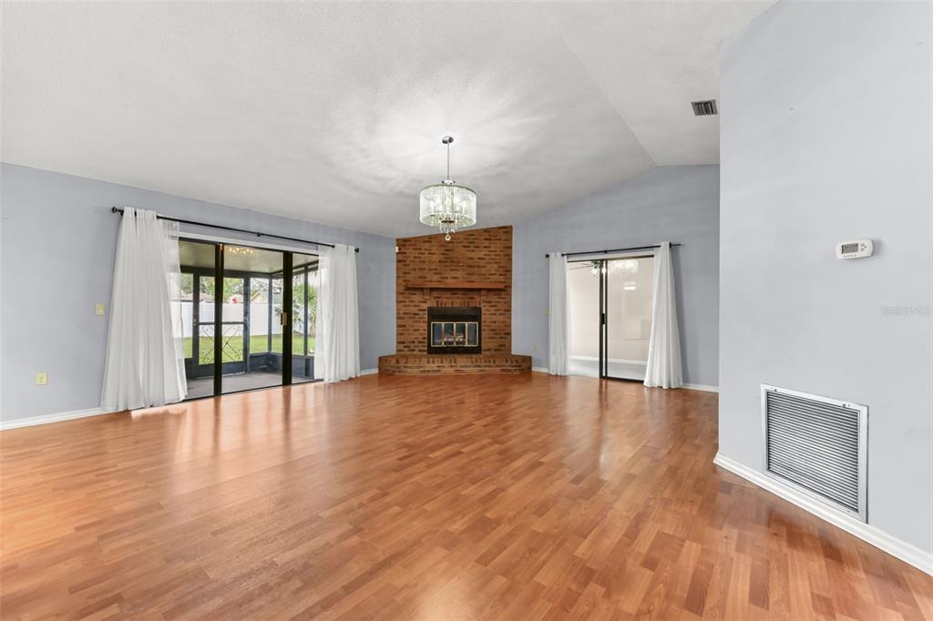1580 East Normandy Boulevard Deltona, FL 32725 - Photo 31 of 46 a view of an empty room with window and wooden floor