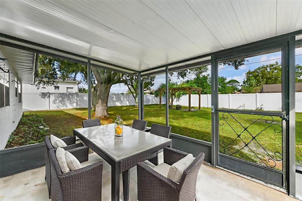 1580 East Normandy Boulevard Deltona, FL 32725 - Photo 34 of 46 a view of an outdoor dining space with furniture