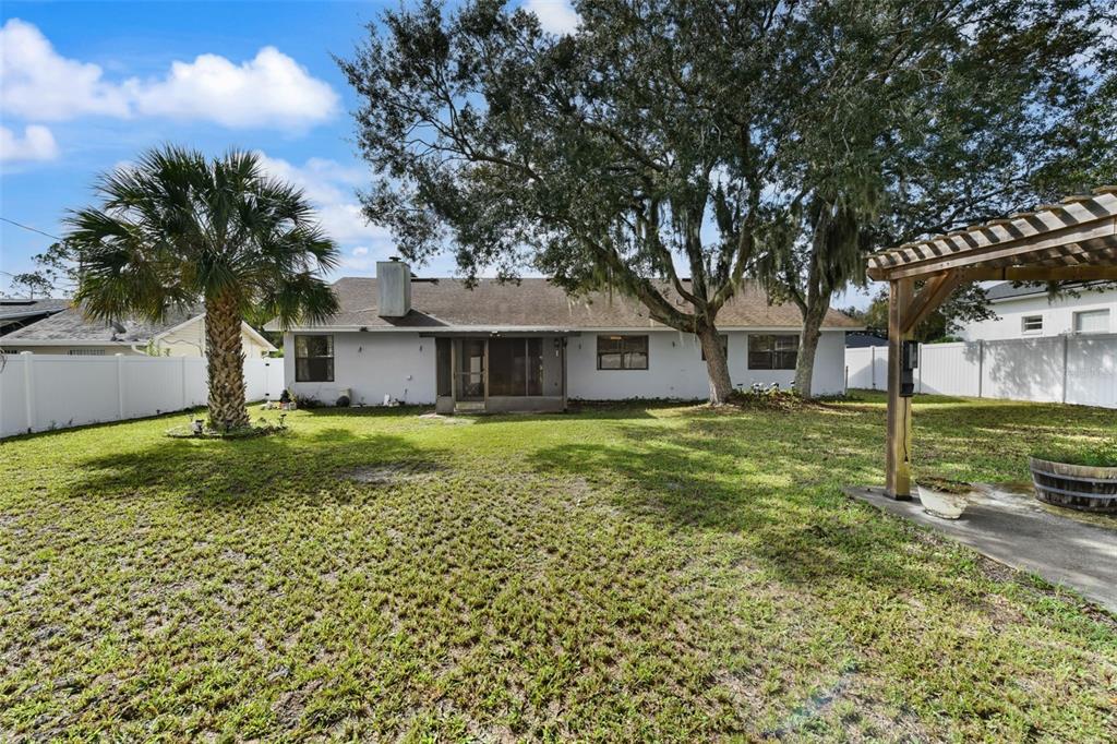 1580 East Normandy Boulevard Deltona, FL 32725 - Photo 41 of 46 a house view with a garden space