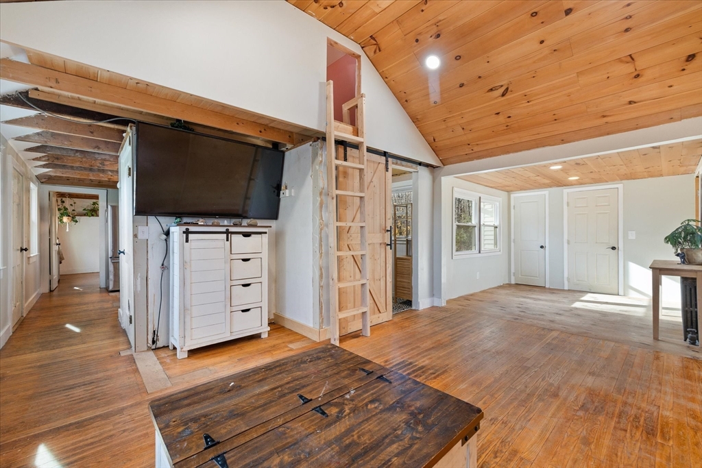 1350 Thresher Road Hardwick, MA 01037 - Photo 11 of 37 a view of a livingroom with wooden floor