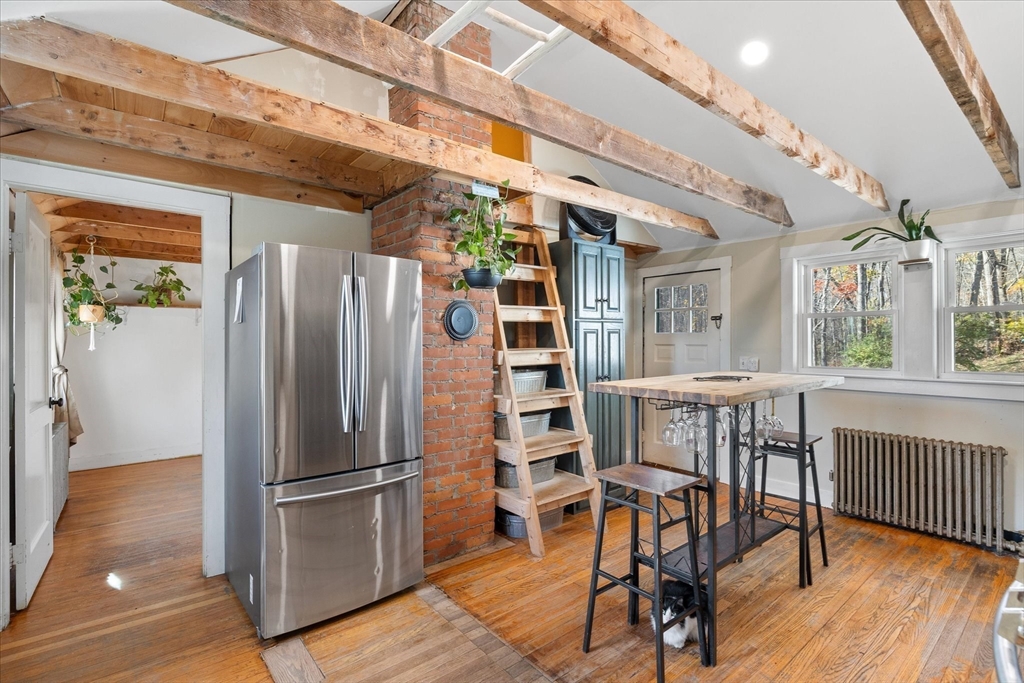 1350 Thresher Road Hardwick, MA 01037 - Photo 12 of 37 a view of a hallway with wooden floor and entryway