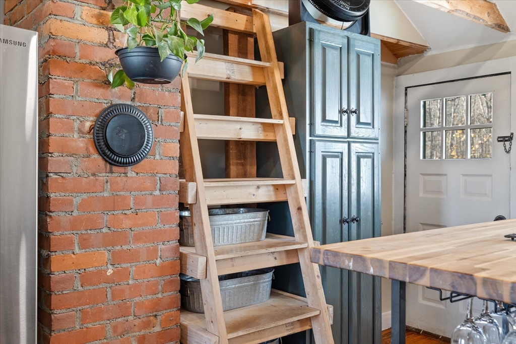 1350 Thresher Road Hardwick, MA 01037 - Photo 18 of 37 a view of a livingroom with furniture and front door