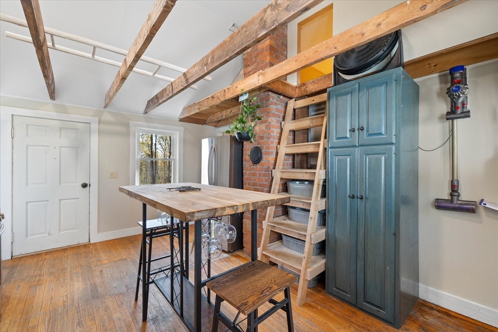 1350 Thresher Road Hardwick, MA 01037 - Photo 19 of 37 a view of a room with furniture and wooden floor