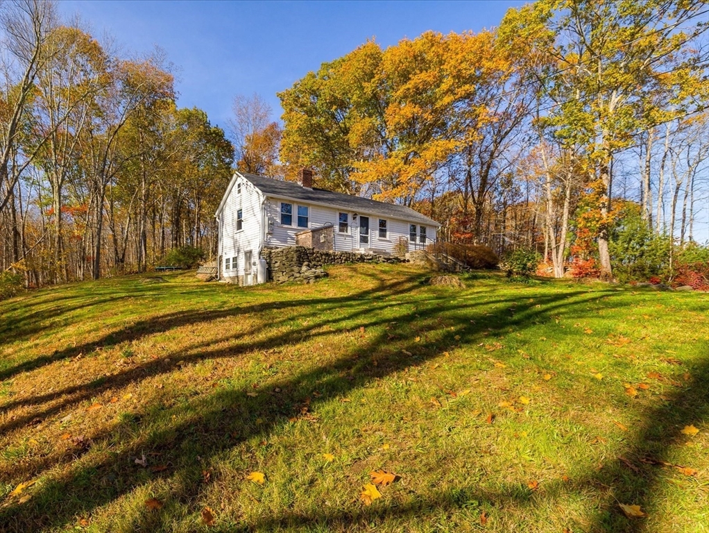1350 Thresher Road Hardwick, MA 01037 - Photo 2 of 37 a view of a house with a big yard