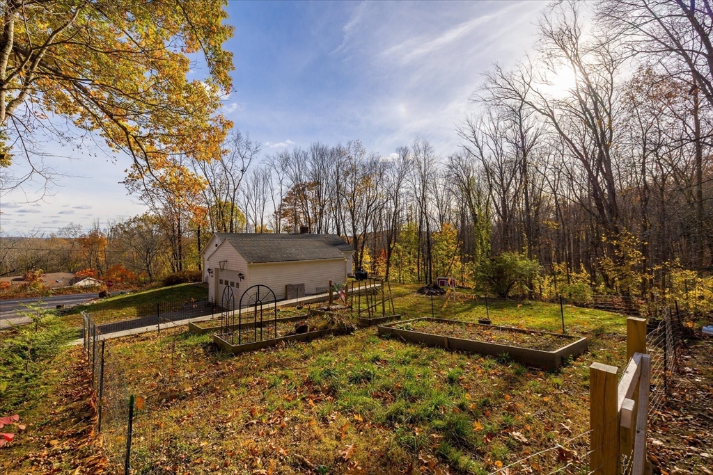 1350 Thresher Road Hardwick, MA 01037 - Photo 33 of 37 a view of a yard with a tree