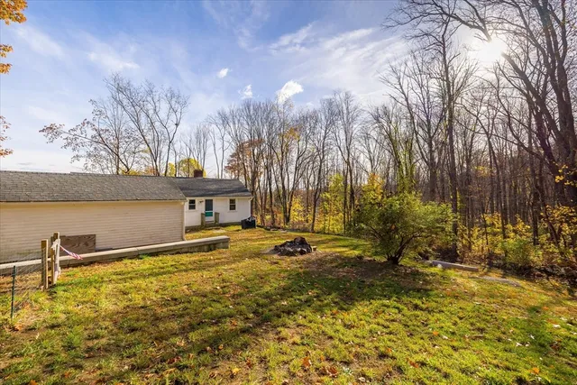 a view of a lake with a building in the background