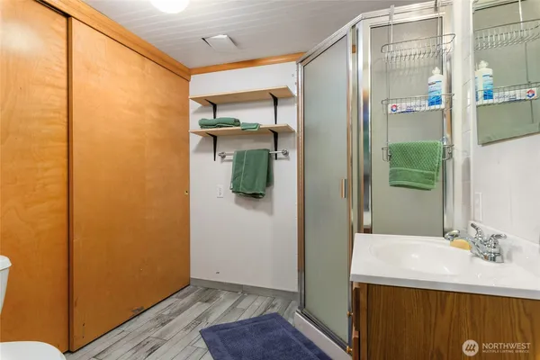a bathroom with a sink and mirror