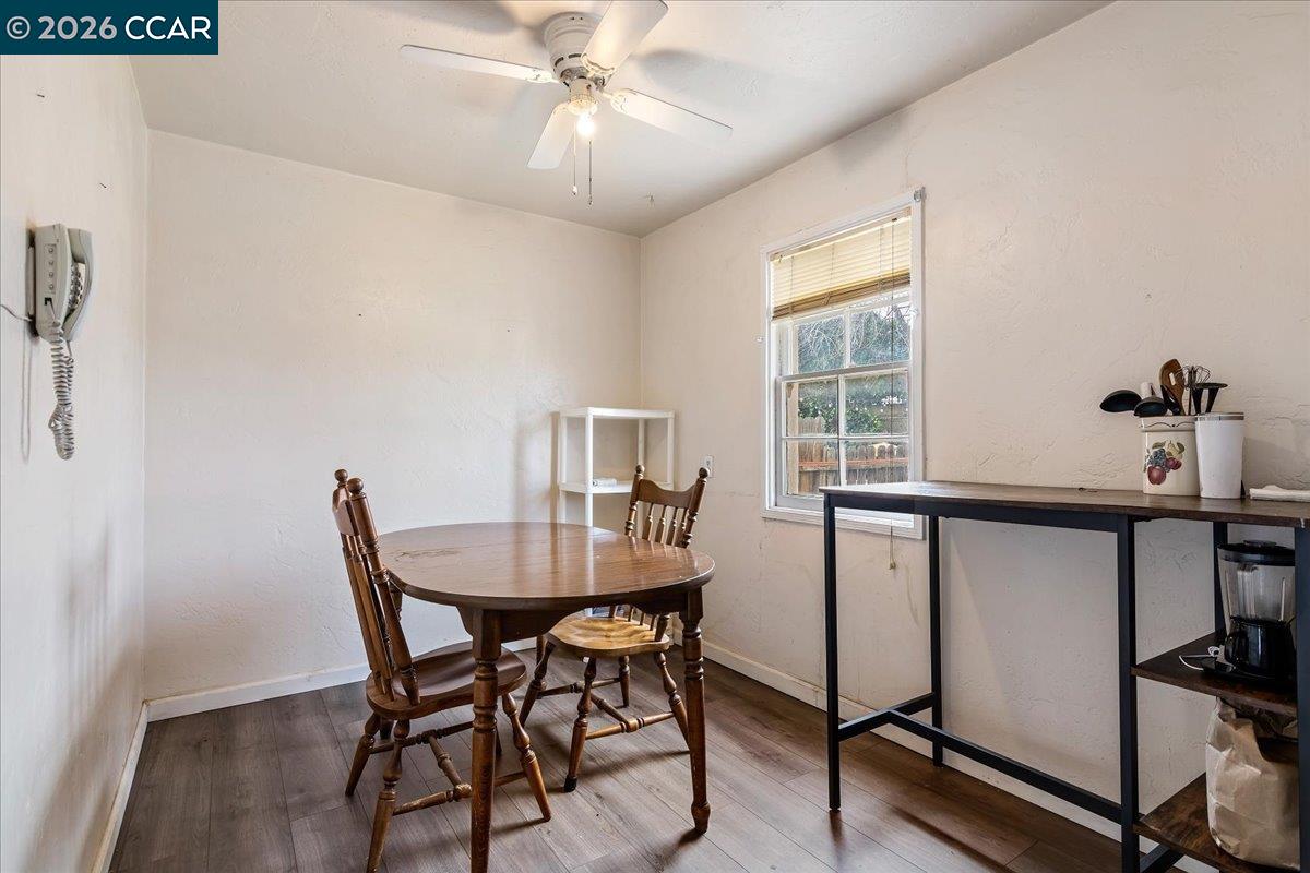 178 Army Street Pittsburg, CA 94565 - Photo 11 of 24 a view of a dining room with furniture window and wooden floor