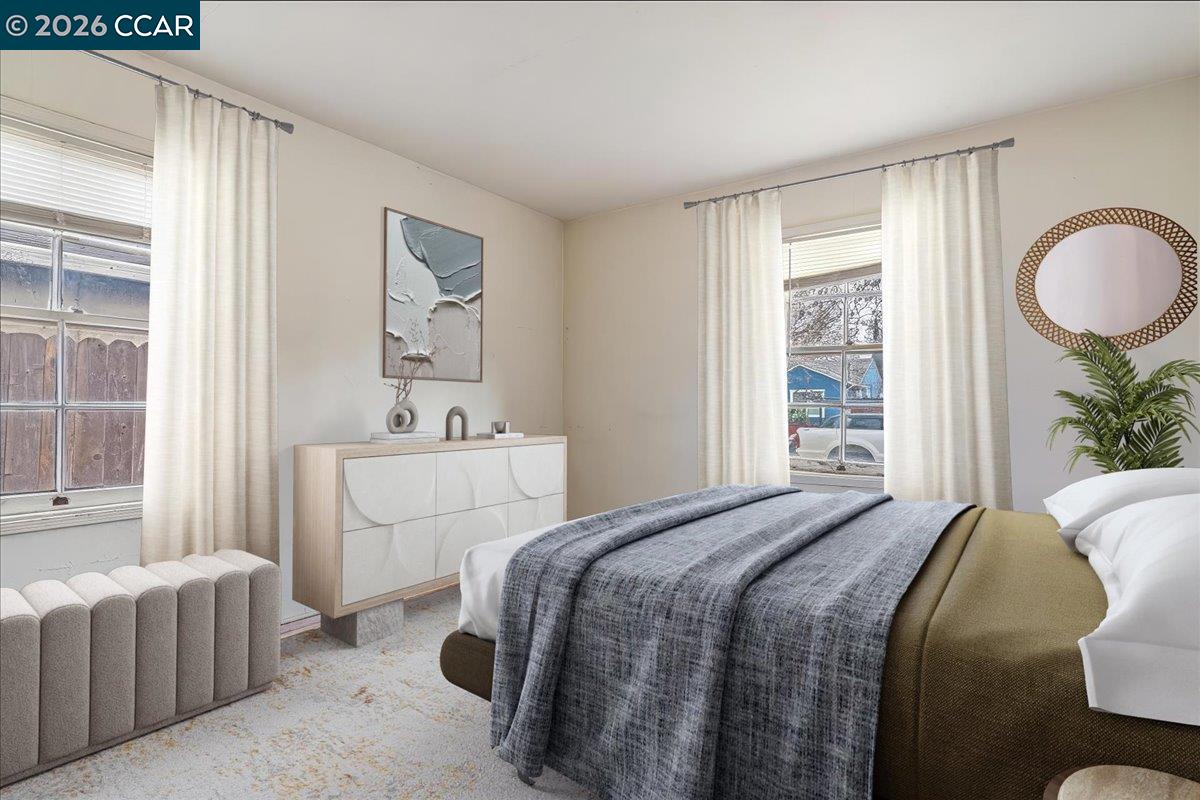 178 Army Street Pittsburg, CA 94565 - Photo 15 of 24 a bedroom with a bed and a window