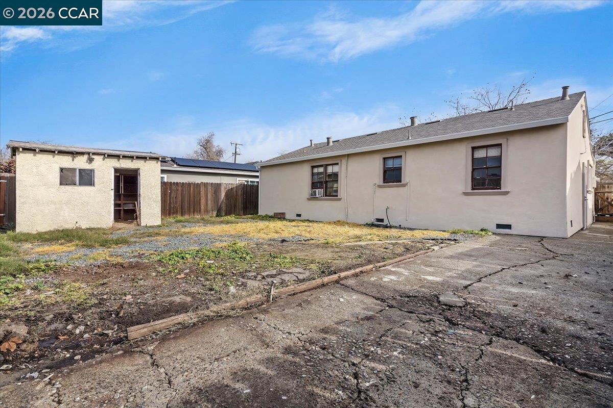 178 Army Street Pittsburg, CA 94565 - Photo 22 of 24 a house with trees in the background