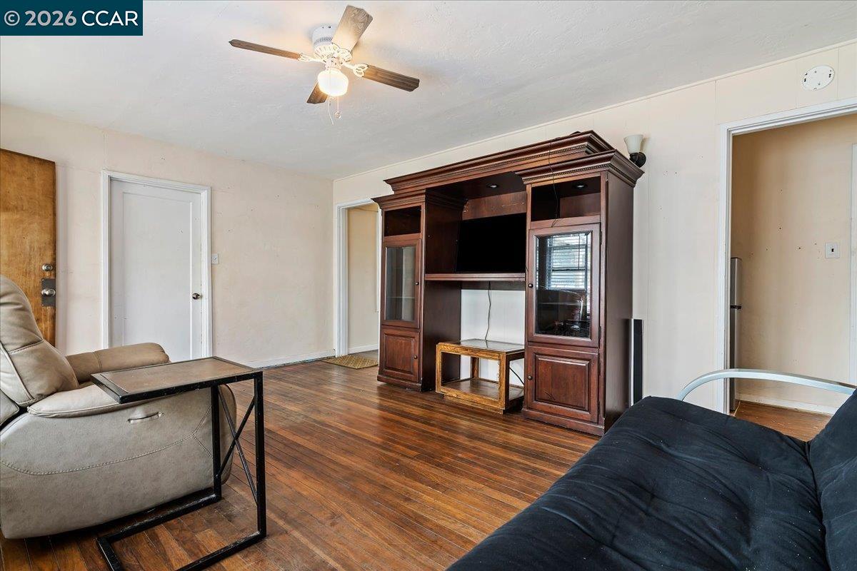 178 Army Street Pittsburg, CA 94565 - Photo 5 of 24 a living room with furniture and a ceiling fan