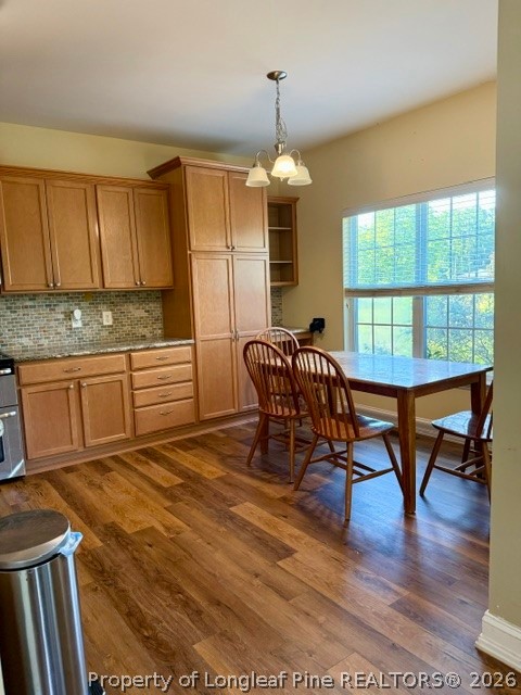 1284 L Cooper Road Cameron, NC 28326 - Photo 6 of 24 a view of a dining room with furniture window and wooden floor