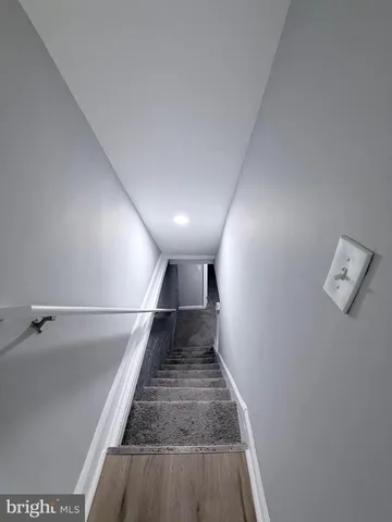 a view of hallway with stairs