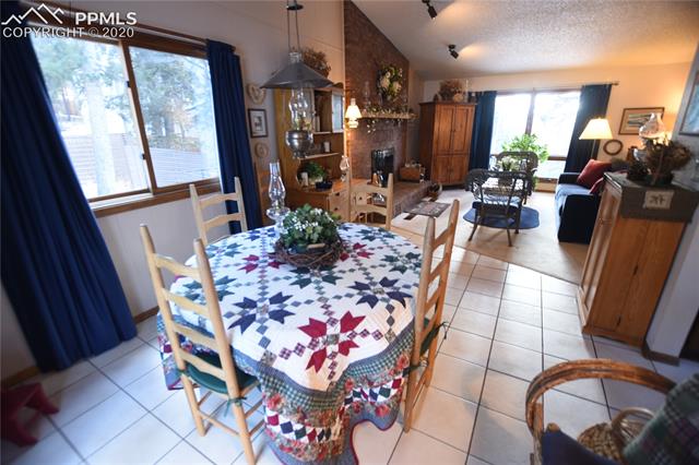 1161 Pine Ridge Road Woodland Park, CO 80863 - Photo 9 of 40 Open Dining Room.