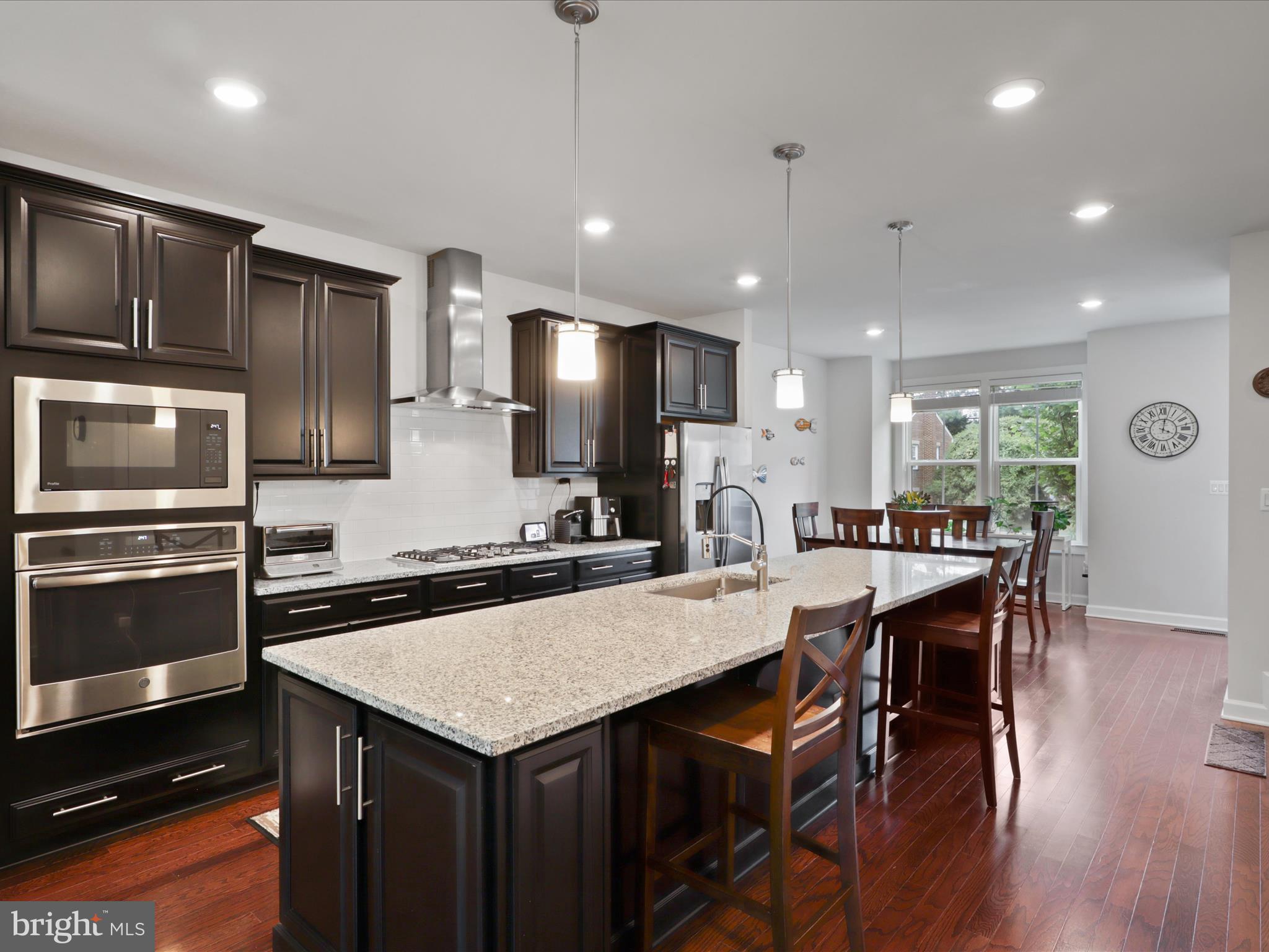 5742 10th Road North Arlington, VA 22205 - Photo 13 of 44 a kitchen with a center island appliances and cabinets