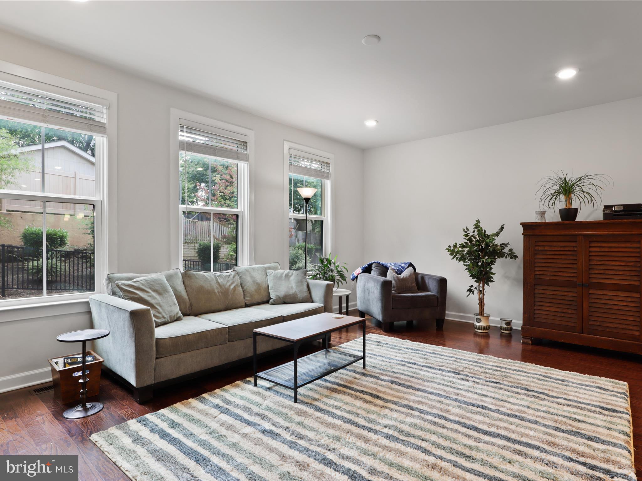 5742 10th Road North Arlington, VA 22205 - Photo 15 of 44 a living room with furniture and a wooden floor