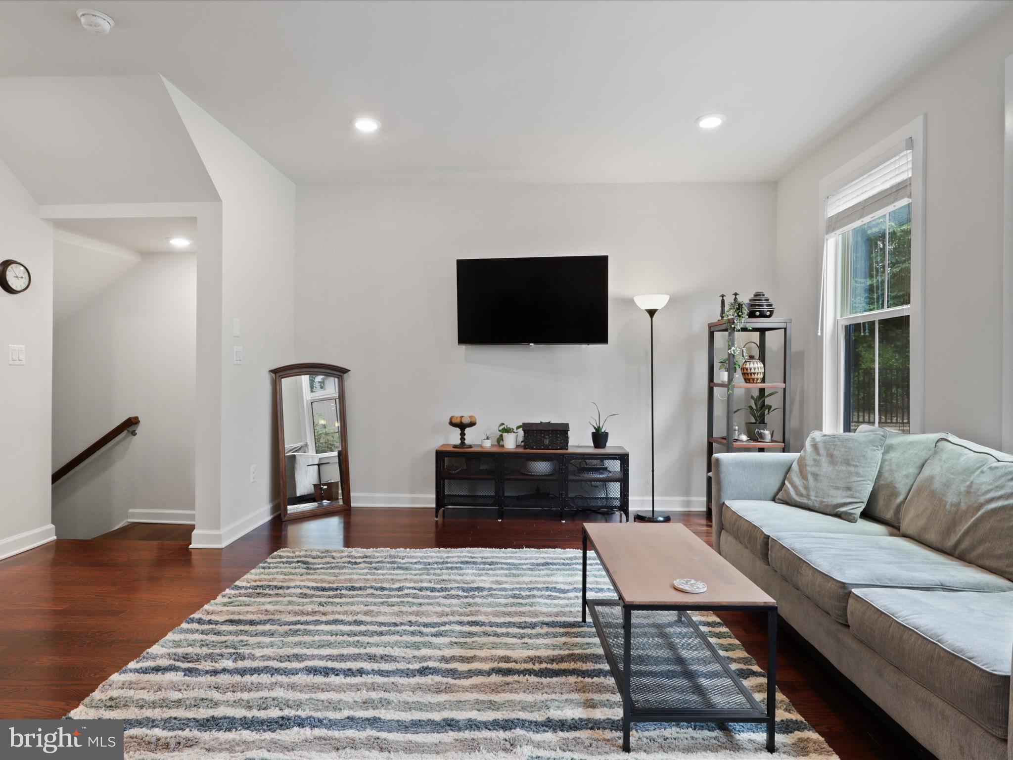 5742 10th Road North Arlington, VA 22205 - Photo 19 of 44 a living room with furniture and a flat screen tv