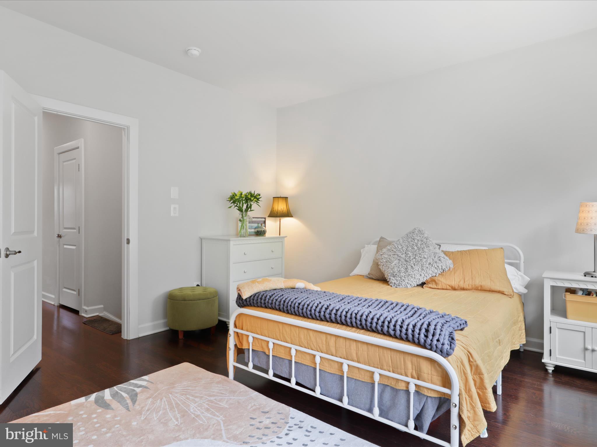 5742 10th Road North Arlington, VA 22205 - Photo 21 of 44 a bedroom with a bed and wooden floor