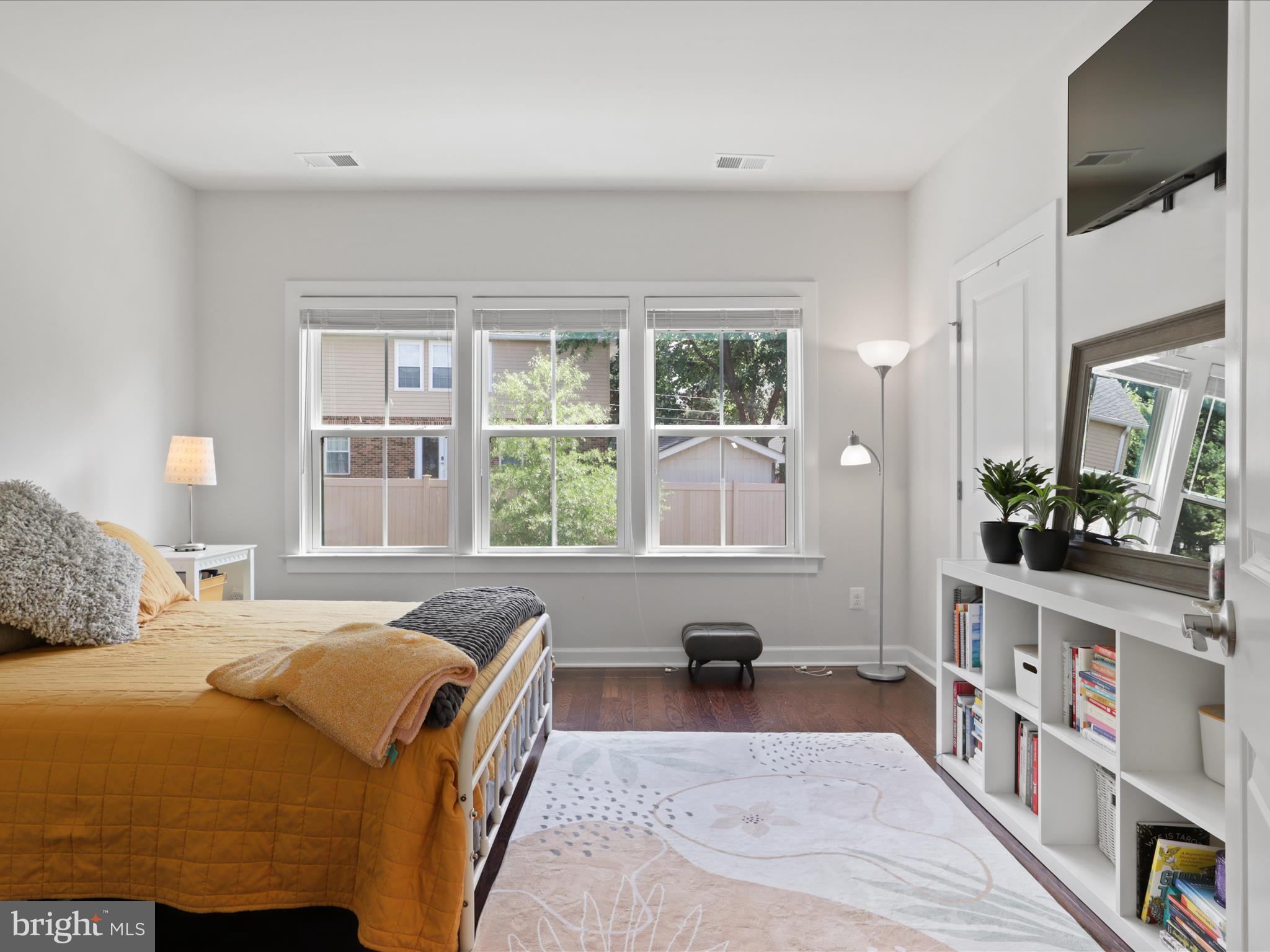 5742 10th Road North Arlington, VA 22205 - Photo 22 of 44 a bedroom with a bed and a large window