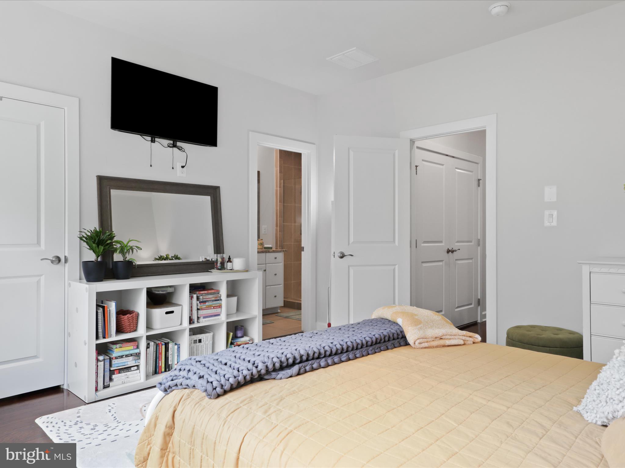 5742 10th Road North Arlington, VA 22205 - Photo 24 of 44 a bedroom with a flat screen tv and a bed