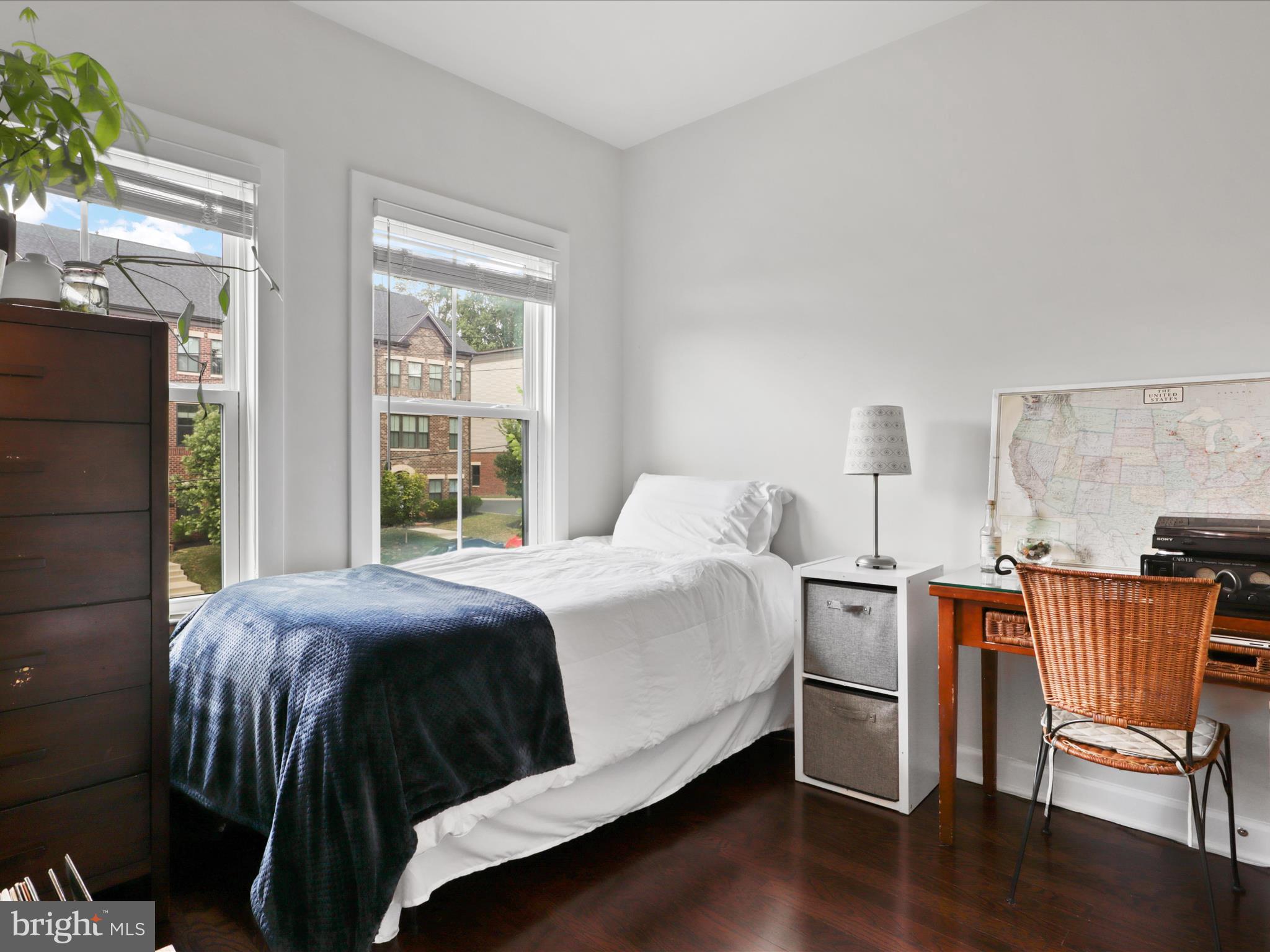 5742 10th Road North Arlington, VA 22205 - Photo 27 of 44 a bedroom with a bed and wooden floor