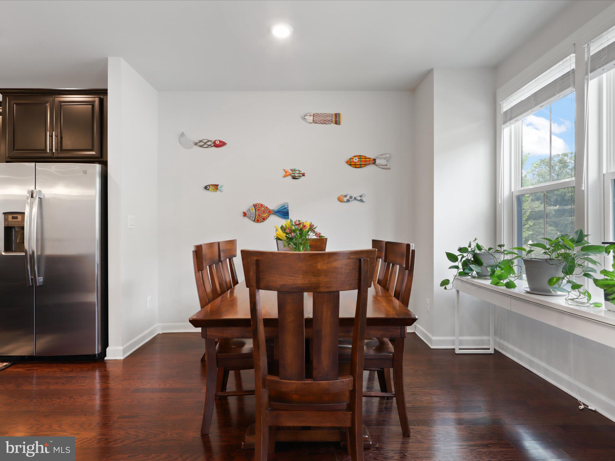 5742 10th Road North Arlington, VA 22205 - Photo 7 of 44 a view of a dining room with furniture window and wooden floor