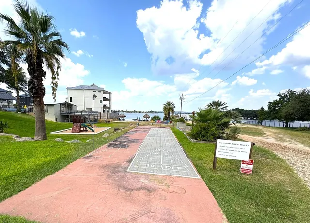 a view of swimming pool with outdoor seating