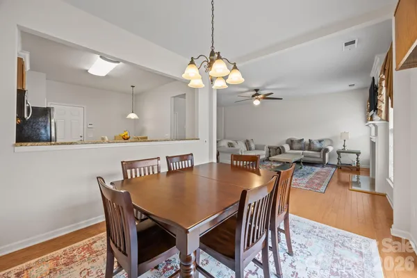 a view of a dining room with furniture
