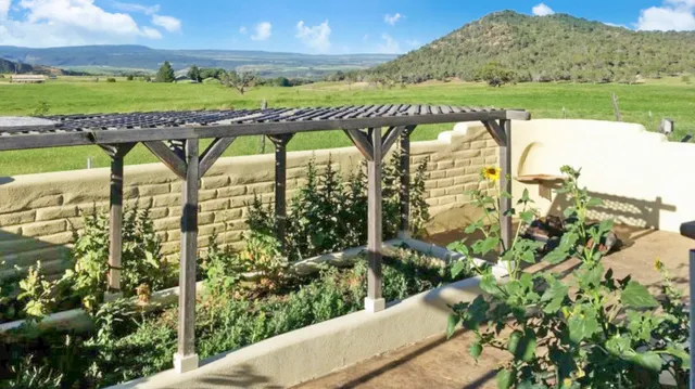 a view of a swimming pool with a patio