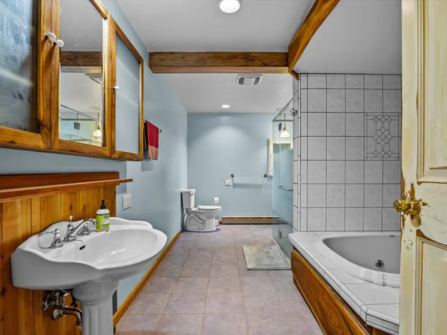 a bathroom with a sink and a bathtub