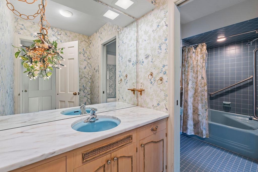 3723 Brookview Road Rockford, IL 61107 - Photo 20 of 44 a bathroom with a sink and a mirror