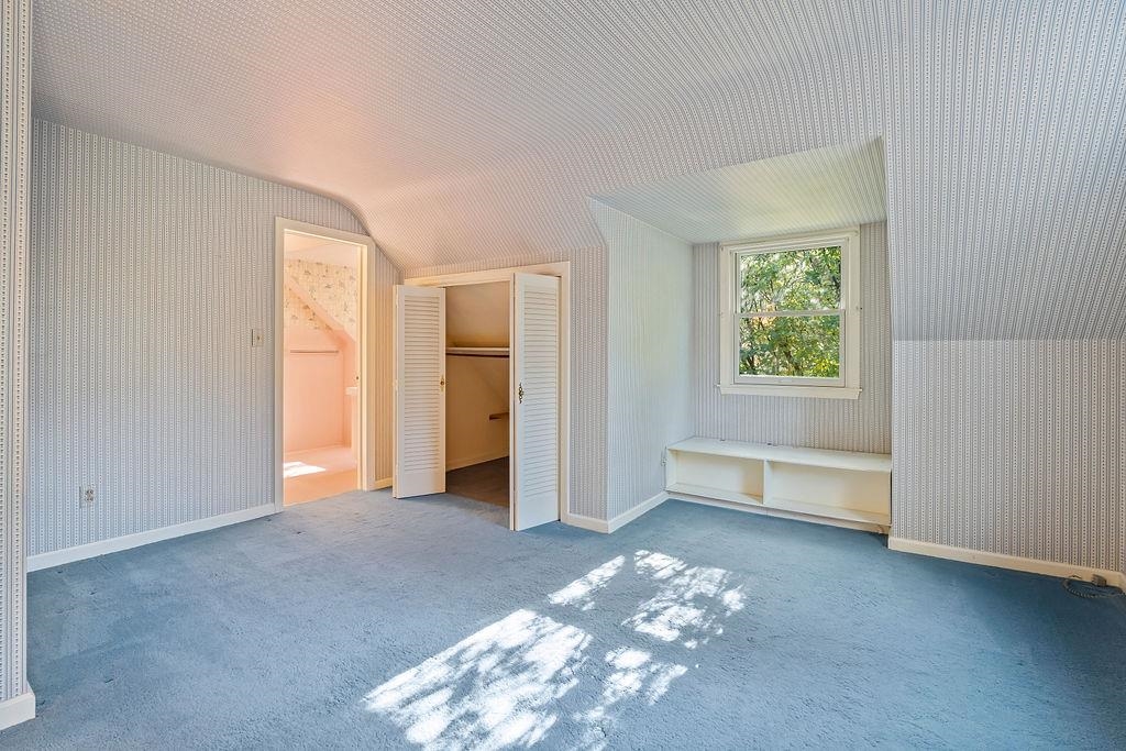 3723 Brookview Road Rockford, IL 61107 - Photo 25 of 44 an empty room with windows and closet