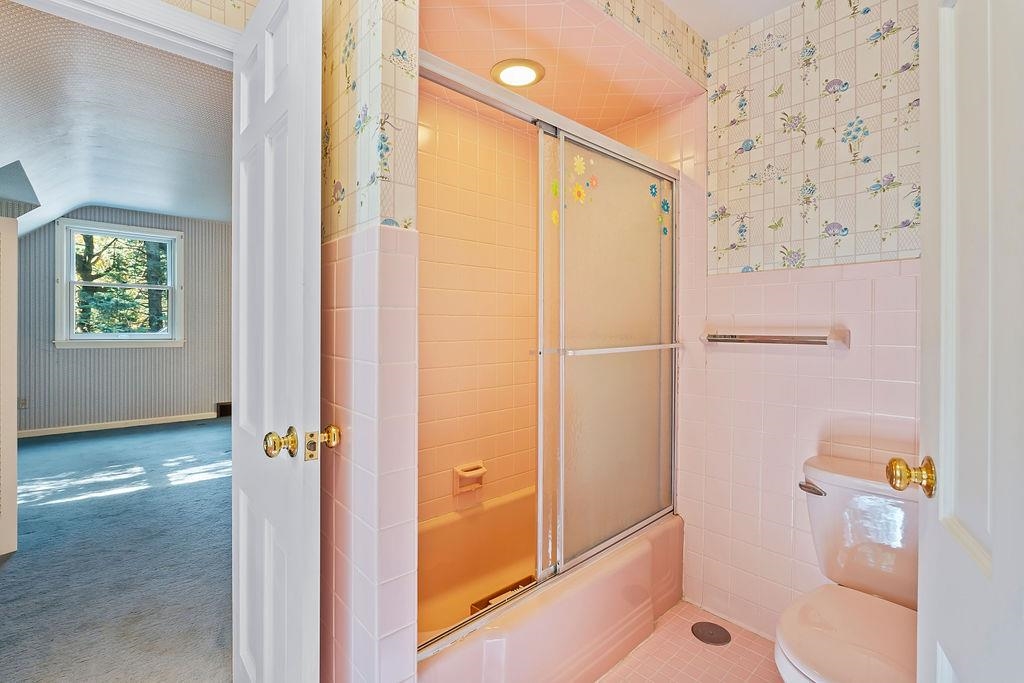 3723 Brookview Road Rockford, IL 61107 - Photo 27 of 44 a bathroom with a shower and a sink