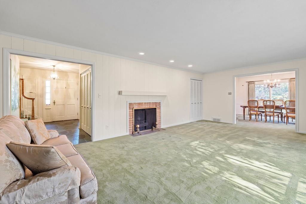 3723 Brookview Road Rockford, IL 61107 - Photo 5 of 44 a spacious bedroom with a bed and a couch