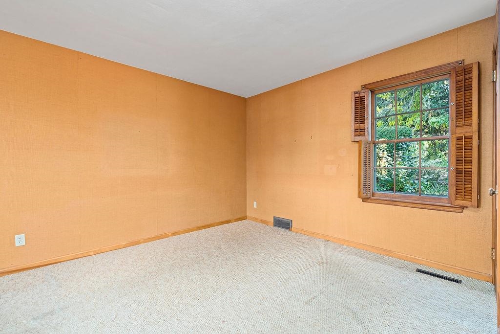 3723 Brookview Road Rockford, IL 61107 - Photo 8 of 44 a view of an empty room with a window