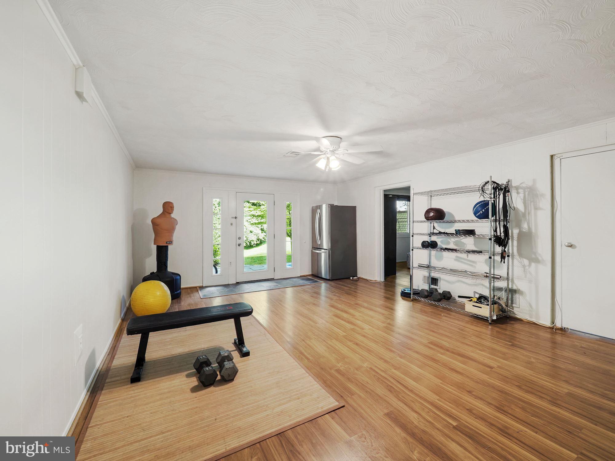 5343 Pooks Hill Road, Unit 40353 Bethesda, MD 20814 - Photo 23 of 57 a living room with furniture and a wooden floor
