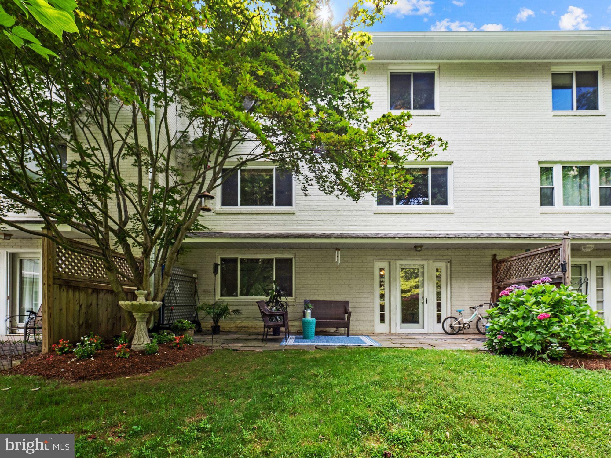 5343 Pooks Hill Road, Unit 40353 Bethesda, MD 20814 - Photo 25 of 57 a view of a house with a yard porch and sitting area