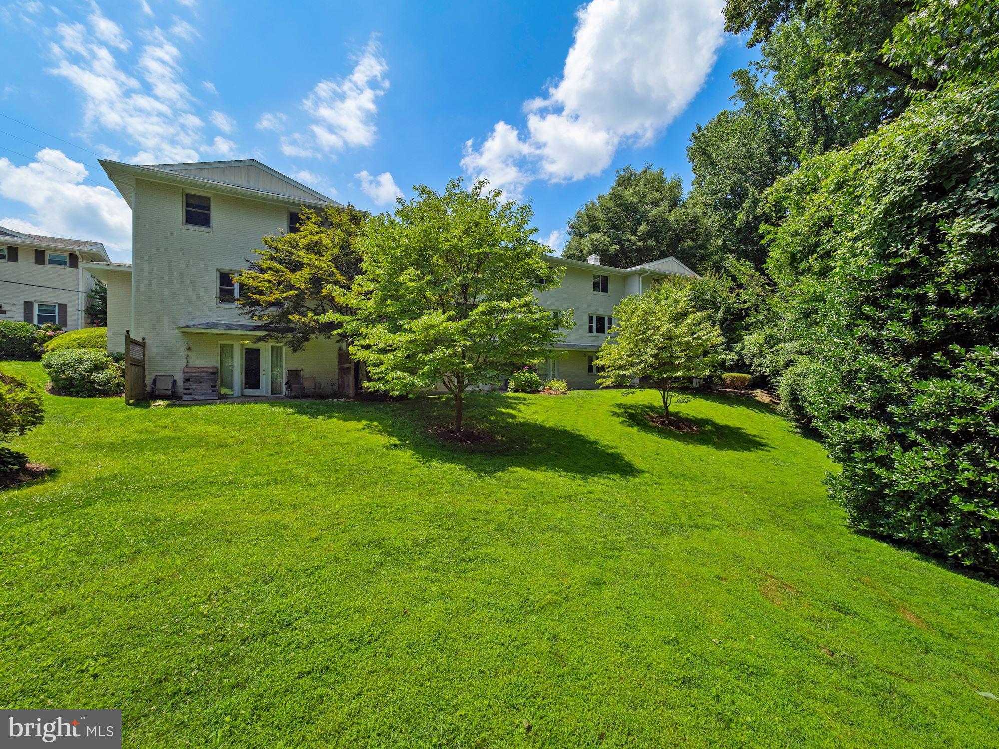5343 Pooks Hill Road, Unit 40353 Bethesda, MD 20814 - Photo 27 of 57 a view of a house with a back yard