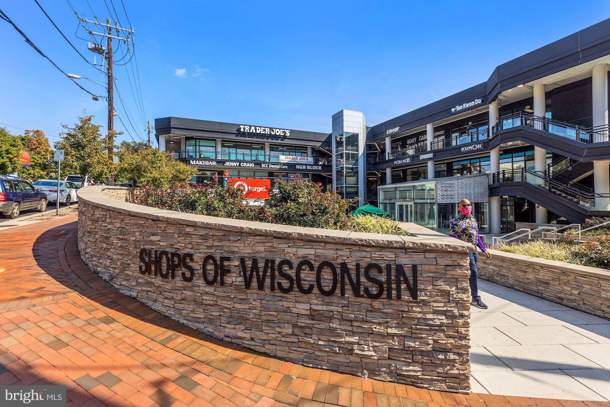 5343 Pooks Hill Road, Unit 40353 Bethesda, MD 20814 - Photo 39 of 57 a view of a large building with a sign on the wall