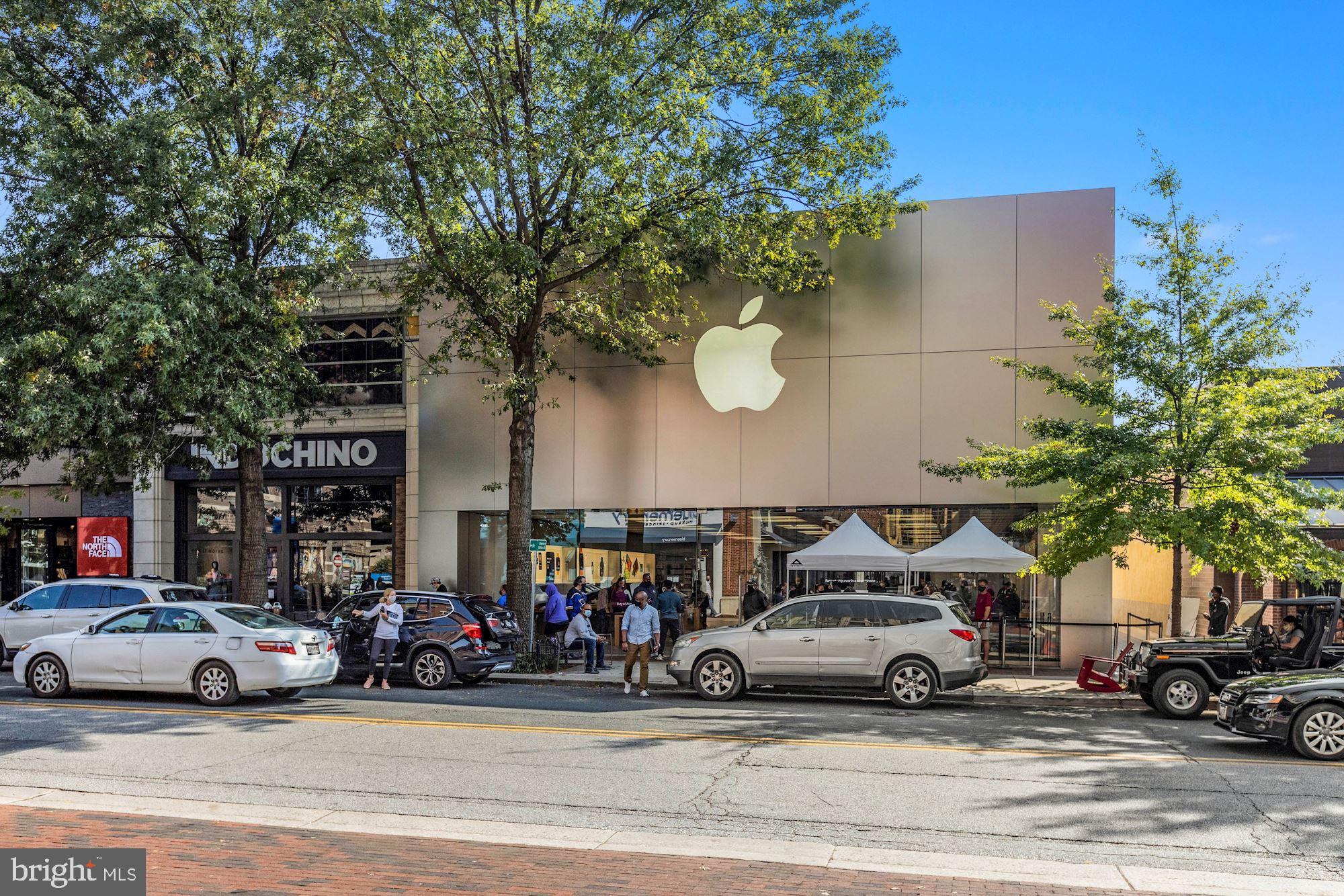 5343 Pooks Hill Road, Unit 40353 Bethesda, MD 20814 - Photo 43 of 57 a view of a cars parked in front of a house