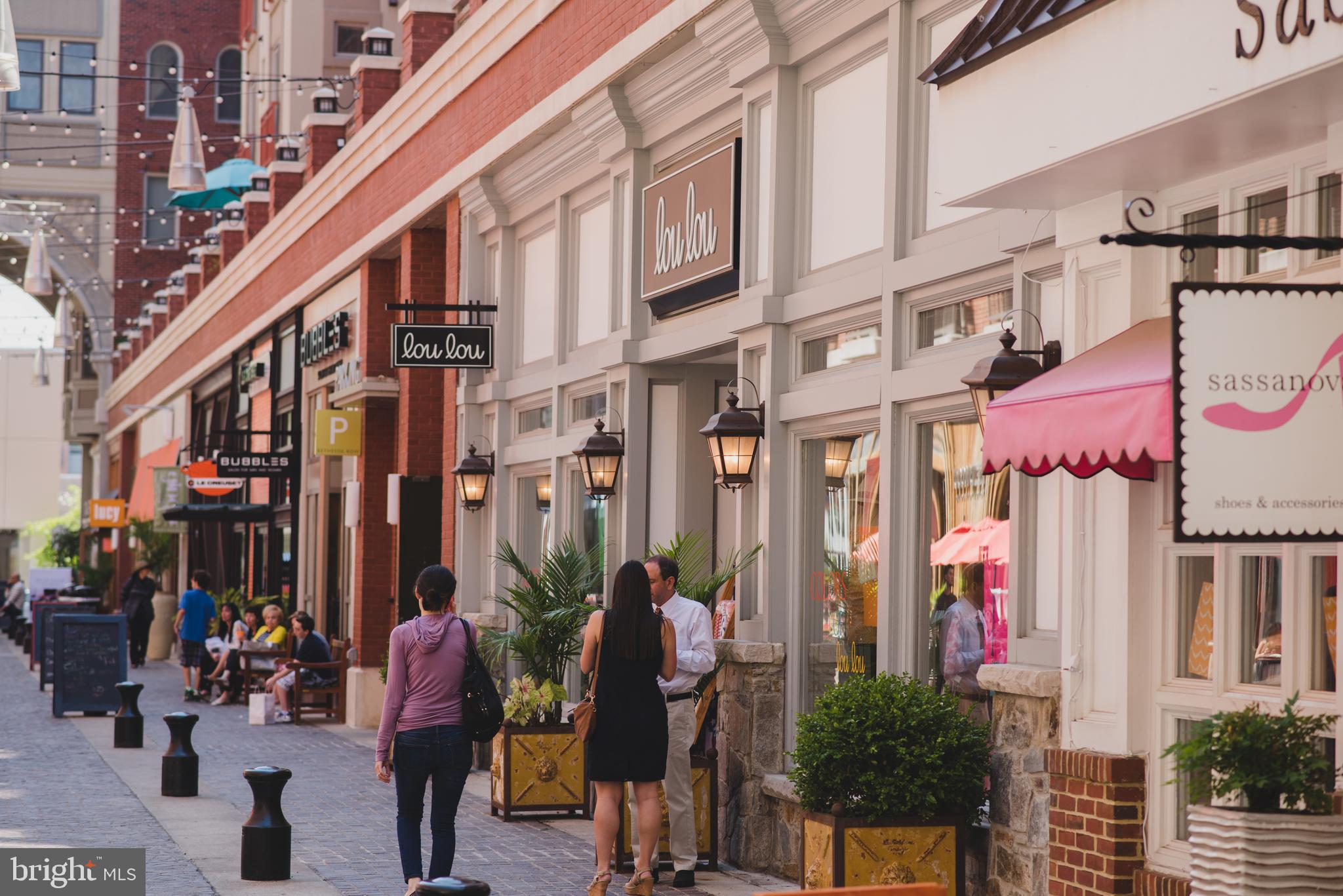 5343 Pooks Hill Road, Unit 40353 Bethesda, MD 20814 - Photo 50 of 57 a group of people sitting in front of building