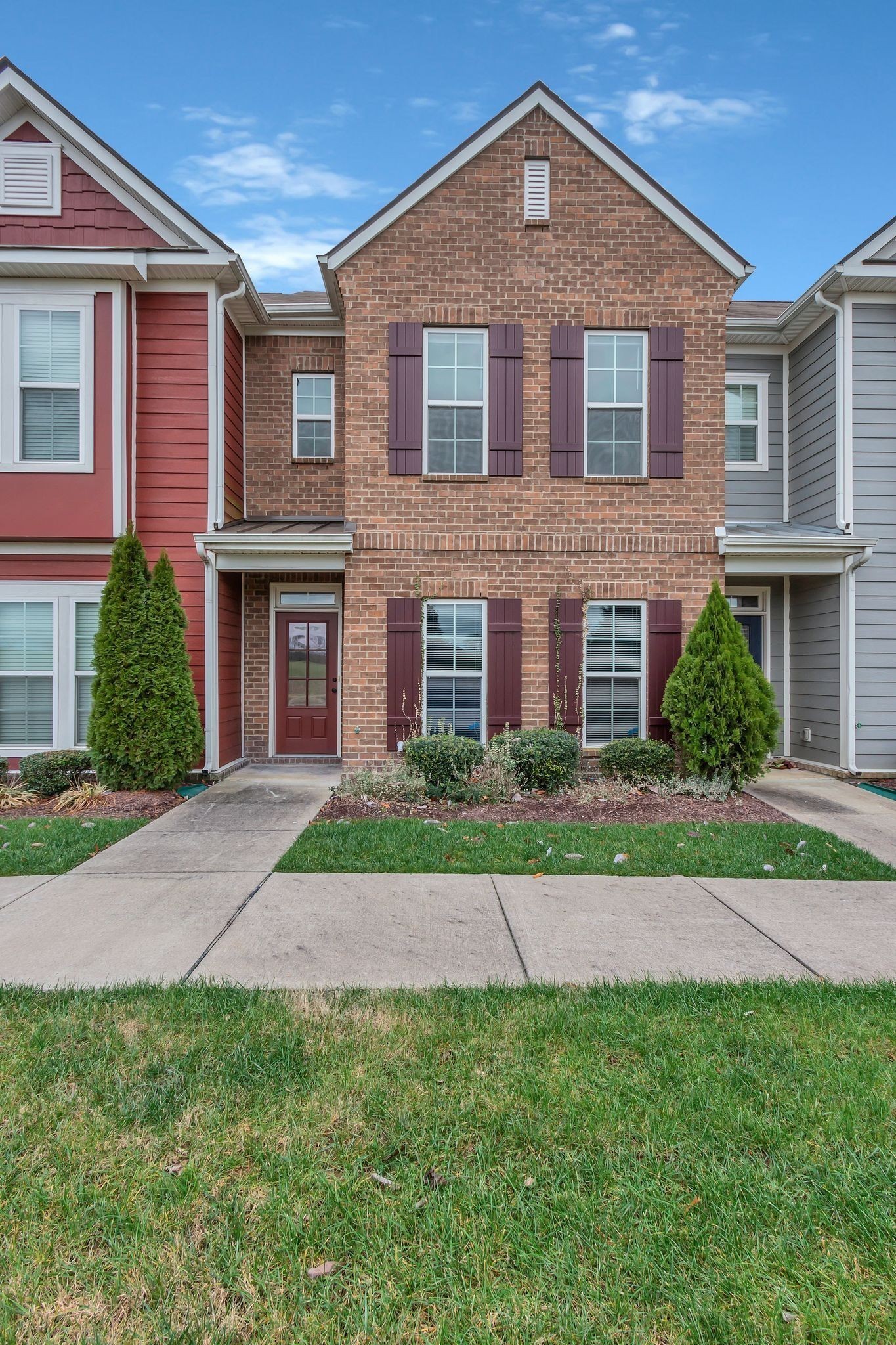 305 Dursley Lane Spring Hill, TN 37174 - Photo 1 of 25 a front view of a house with a yard