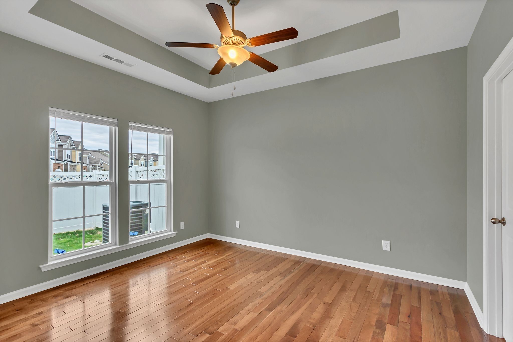 305 Dursley Lane Spring Hill, TN 37174 - Photo 16 of 25 wooden floor in an empty room with a window