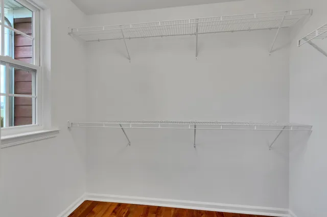 a view of a room with racks on the wall